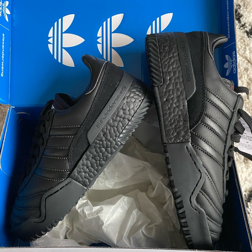 Alexander Wang x Adidas black sneakers.